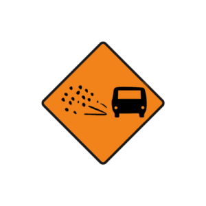 Loose chippings on road