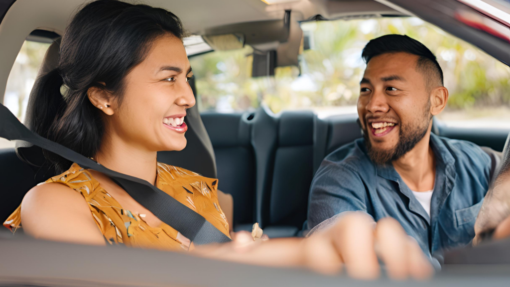 A driving instructor deliver client-centred learning to a pupil.