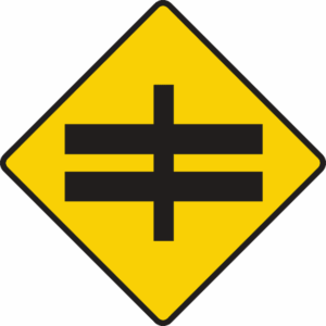 Crossroads with dual carriageway ahead.