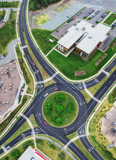 A roundabout where cars are making progress.